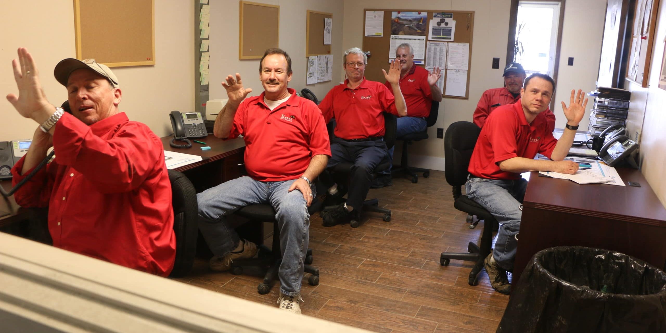 Emtec staff taking calls in the office