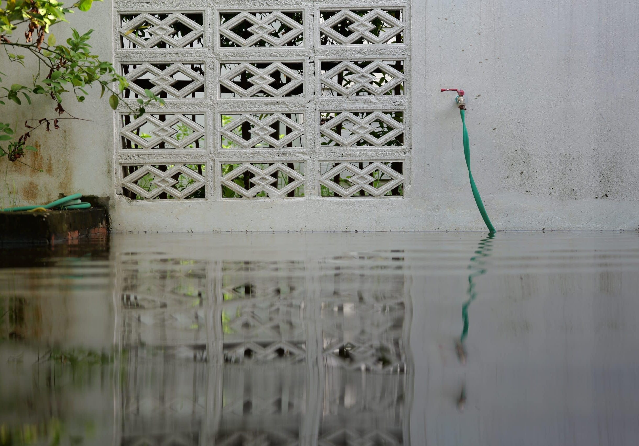 High flood level have submerged the house fence